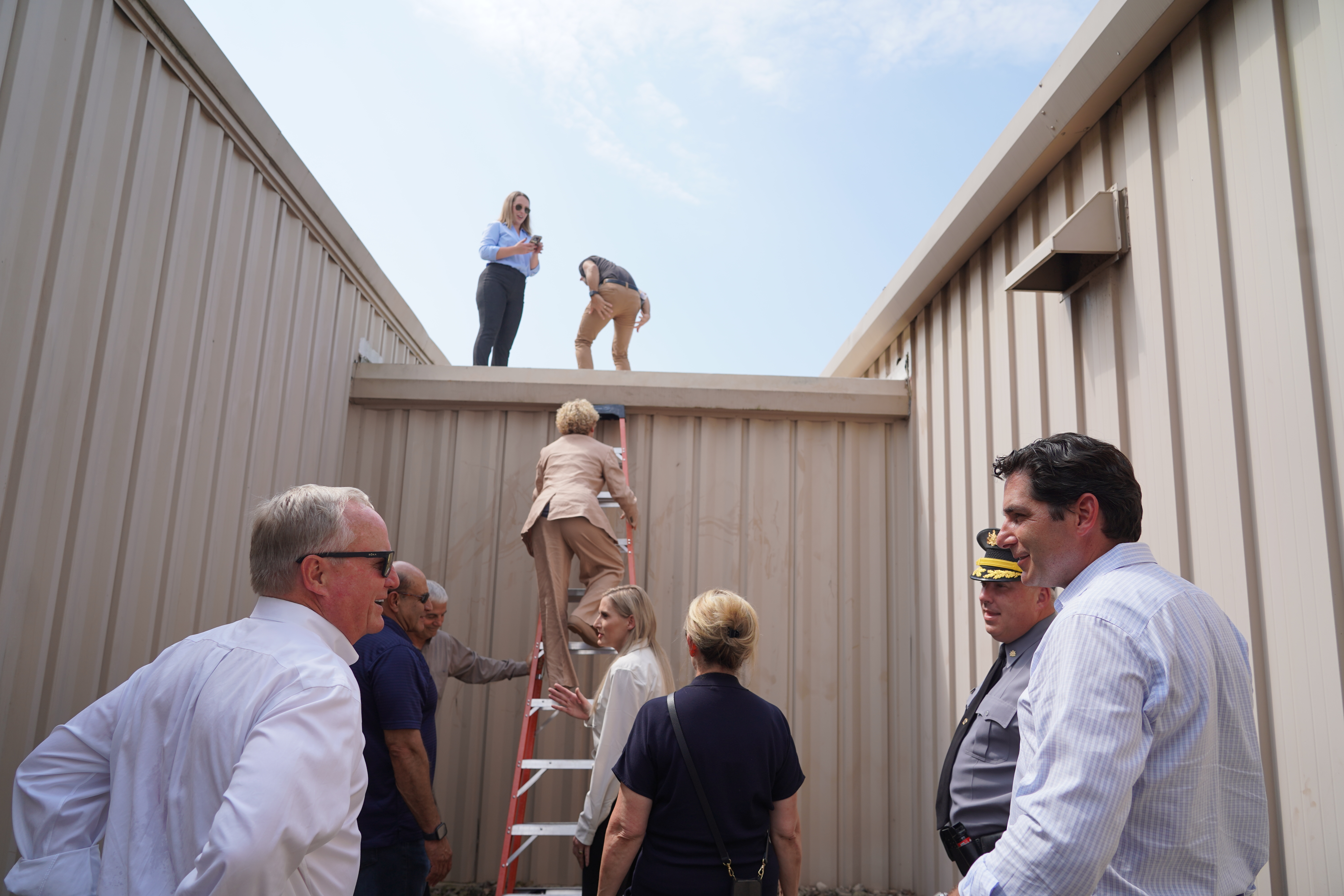 Chrissy climbing farm show building in Butler