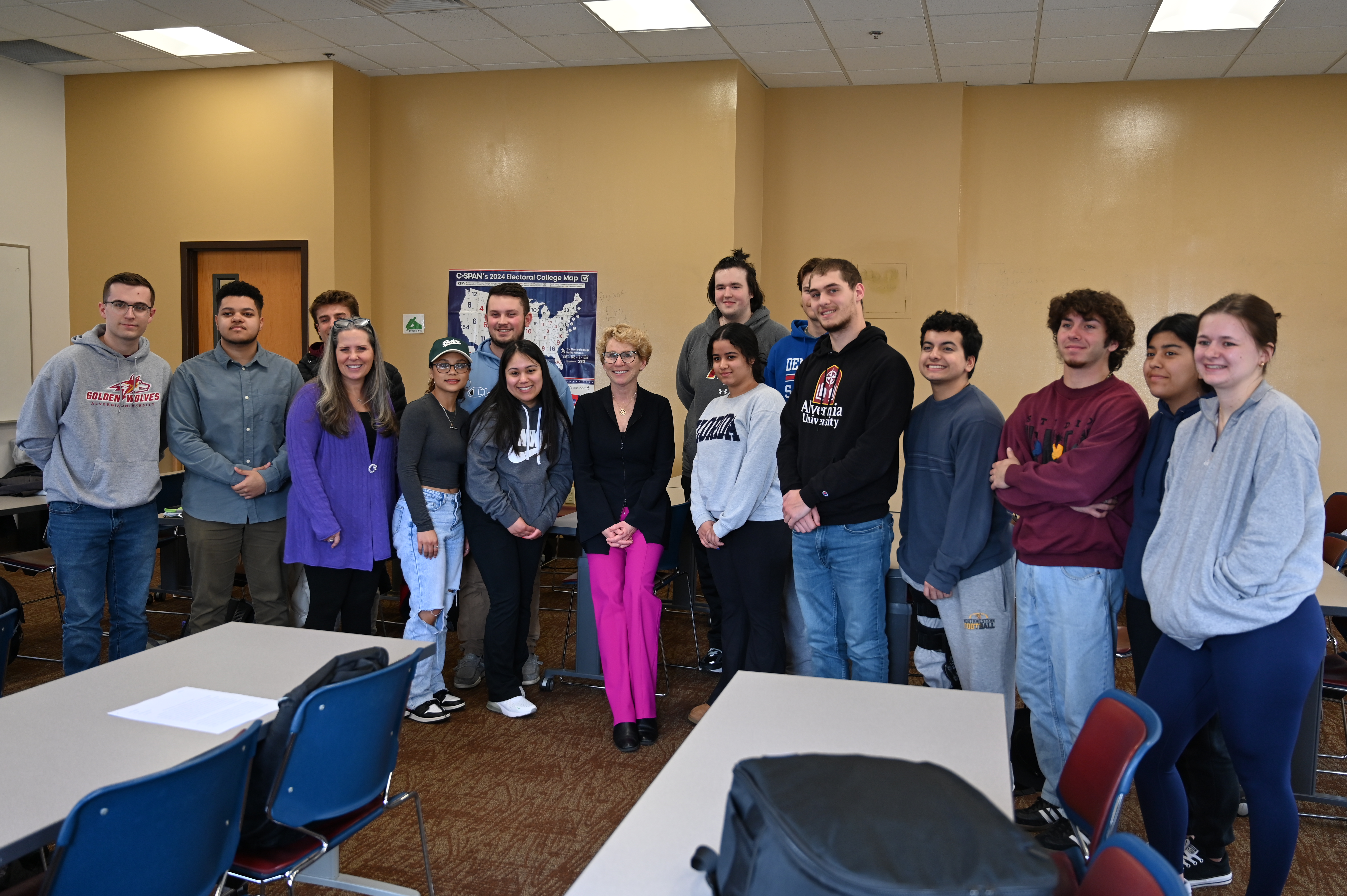 Houlahan poses for photo with Alvernia University students