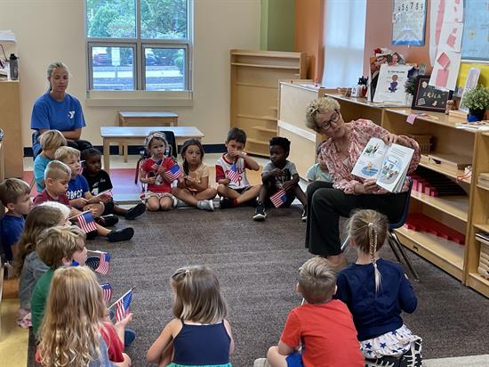 Congresswoman Houlahan reading to a group of children 