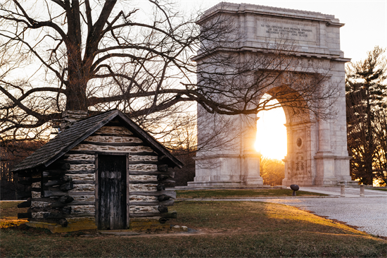 The sun sets on Valley Forge Memorial Arch