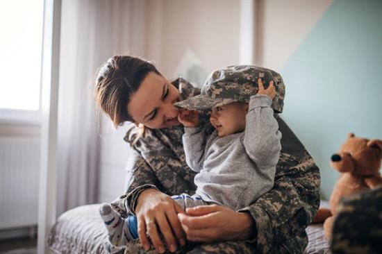 Military Woman with Child